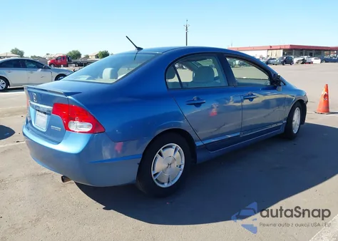 2009 Honda Civic Hybrid from USA, damaged, VIN JHMFA36239S009356